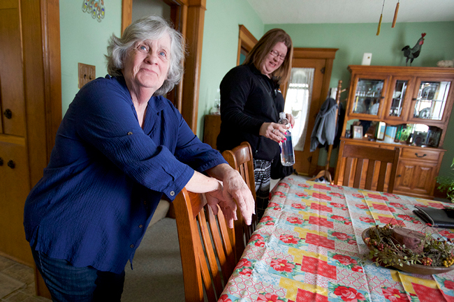 Dupaco member Linda Jackson with Dupaco representative Jacki Clausen during a visit to Linda’s Morley, Iowa home on March 16. During an on-site education event in Anamosa, Iowa earlier this year, Dupaco helped Linda Jackson realize a savings of $20,000. This helped ensure she is able to keep her home after the death of her partner, Tom, last year. (M. Burley photo)